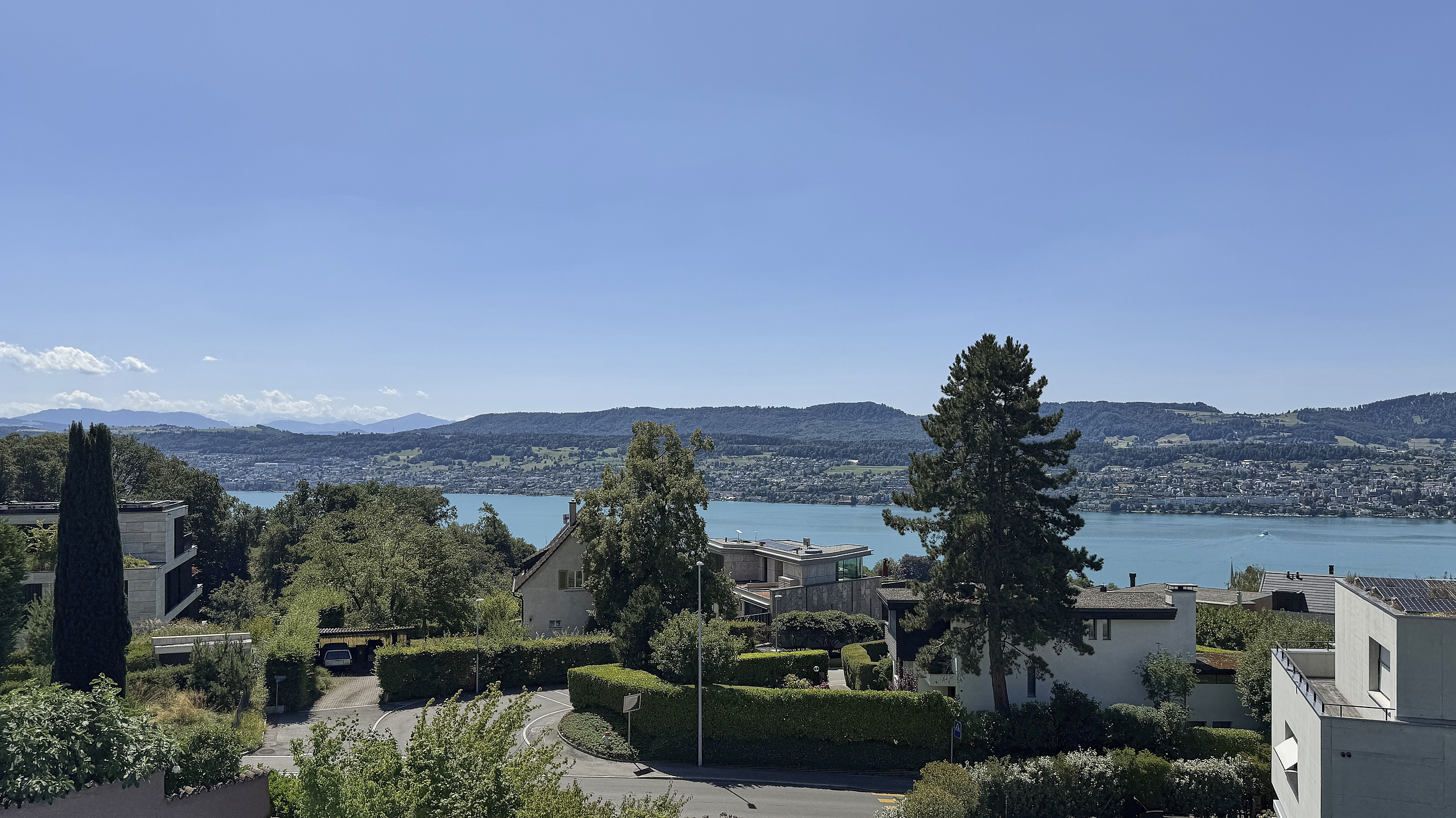 View from the upper floor over gardens to Lake Zurich, Erlenbach