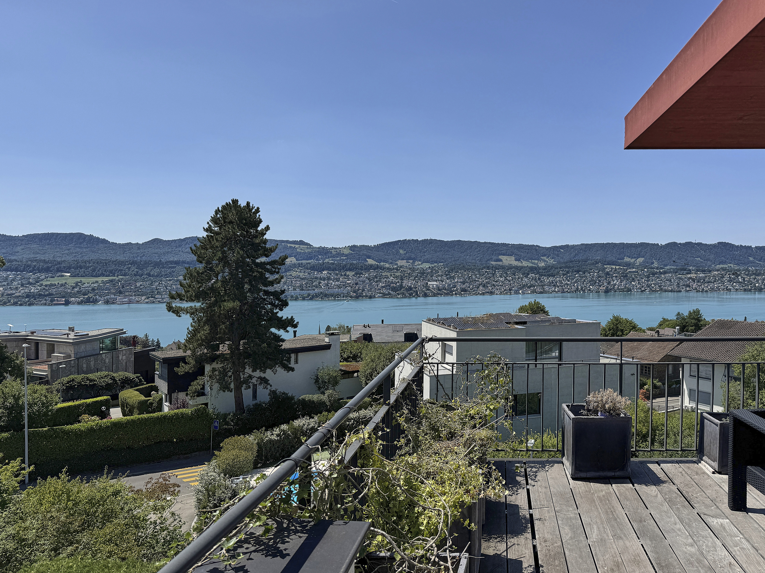 View from the upper floor terrace over gardens to Lake Zurich, Erlenbach