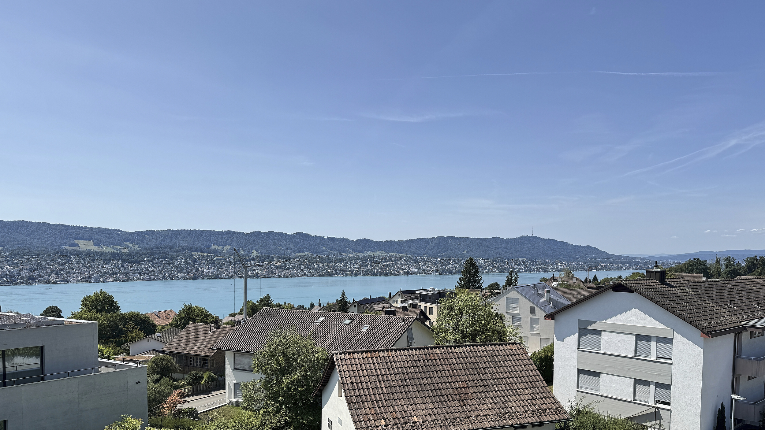 View from the upper floor over gardens to Lake Zurich, Erlenbach